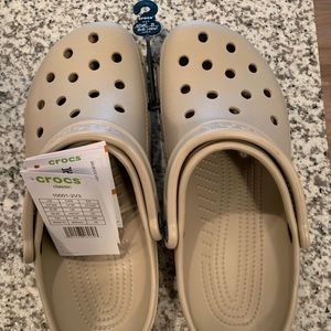 Brand new classic crocs size 9 w and 7 m!